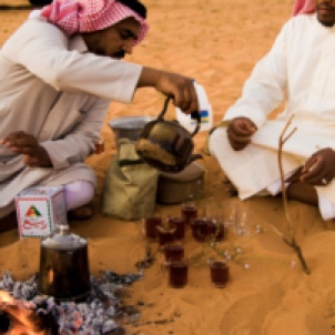 Bedouins making evening tea, desert near the oasis Al Ula, Saudi Arabia